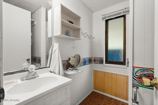 771 Arroyo Pkwy, Ormond Beach, FL 32174 - bathroom with a sink and wainscoting