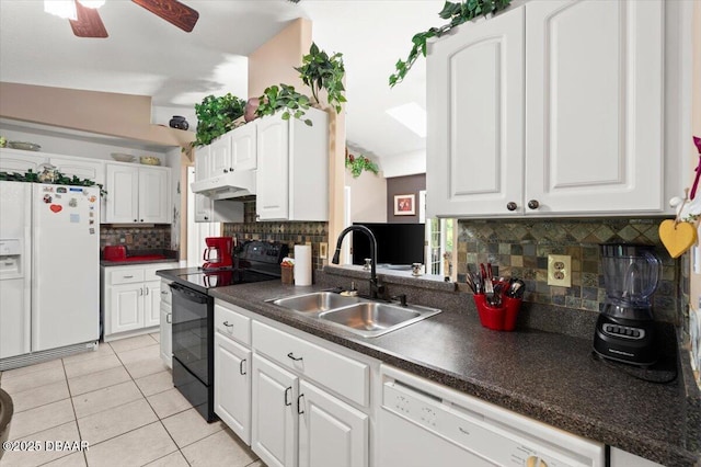 771 Arroyo Pkwy, Ormond Beach, FL 32174 - kitchen with white appliances, a sink, under cabinet range hood, decorative backsplash, and dark countertops
