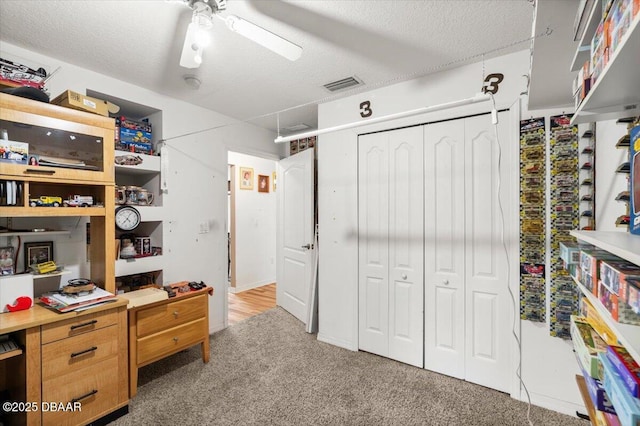 771 Arroyo Pkwy, Ormond Beach, FL 32174 - office featuring light carpet, ceiling fan, and a textured ceiling