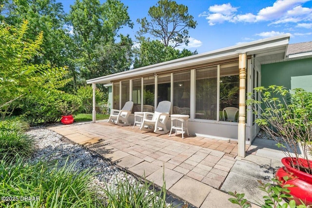 771 Arroyo Pkwy, Ormond Beach, FL 32174 - view of patio / terrace featuring a sunroom