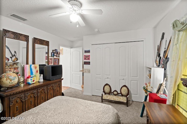 771 Arroyo Pkwy, Ormond Beach, FL 32174 - bedroom featuring a textured ceiling, light colored carpet, a closet, and ceiling fan