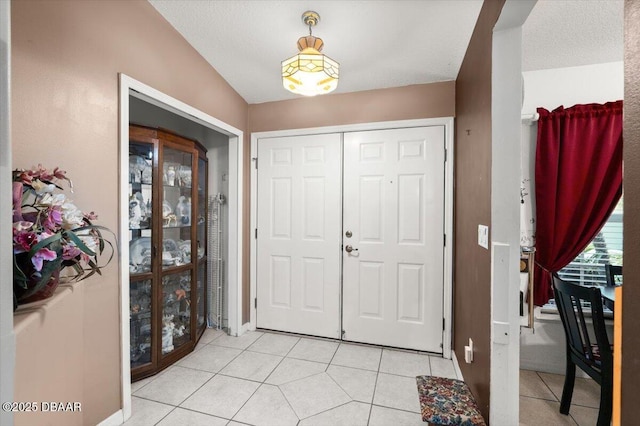 771 Arroyo Pkwy, Ormond Beach, FL 32174 - entrance foyer featuring light tile patterned floors and baseboards