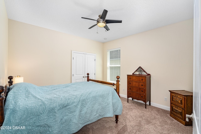 3651 Pini Ave, New Smyrna Beach, FL 32168 - carpeted bedroom with a closet and ceiling fan