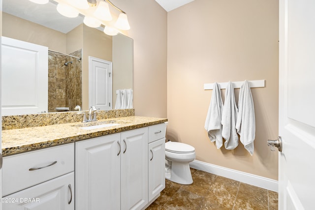 3651 Pini Ave, New Smyrna Beach, FL 32168 - bathroom with toilet, vanity, and a tile shower