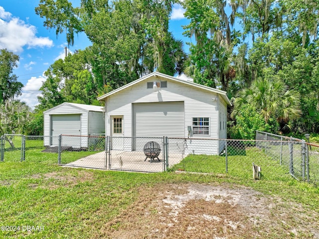 exterior space with a lawn and a garage