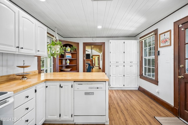 kitchen with white cabinets, light hardwood / wood-style flooring, white appliances, and butcher block countertops