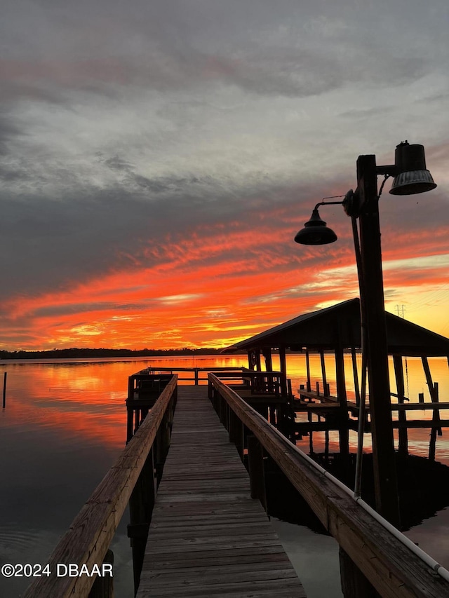 view of dock with a water view