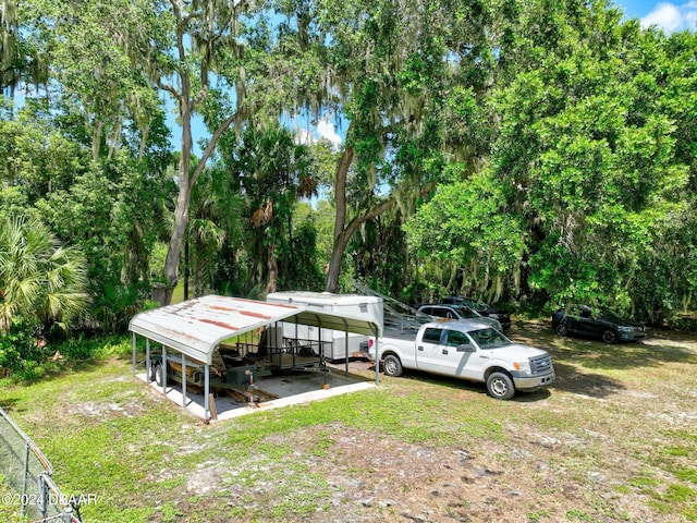 view of yard with a carport