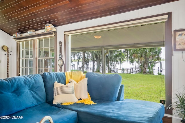 sunroom / solarium featuring wood ceiling