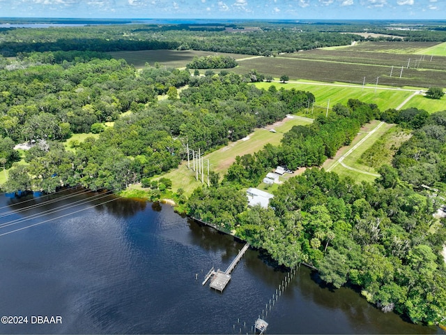 bird's eye view featuring a water view and a rural view