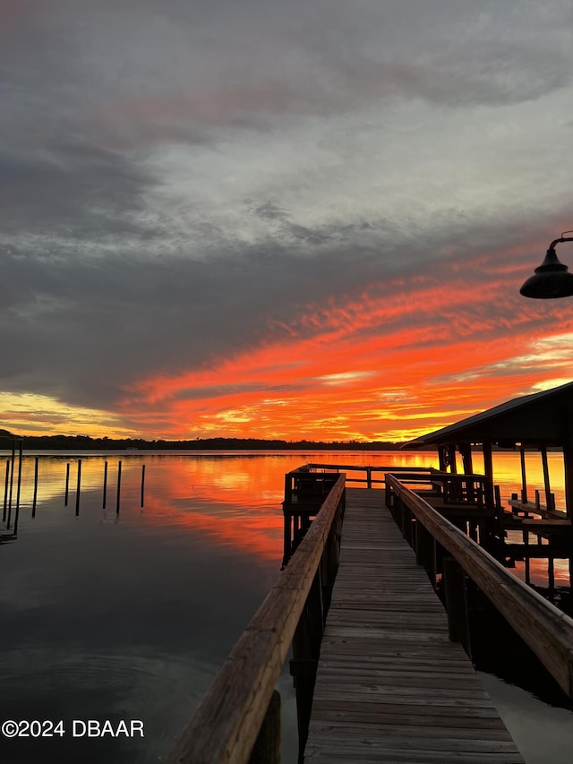 view of dock with a water view