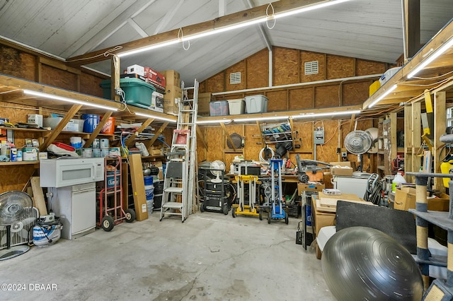 garage with a workshop area