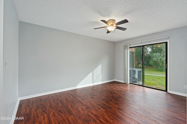 empty room featuring ceiling fan, wood-type flooring, and a textured ceiling