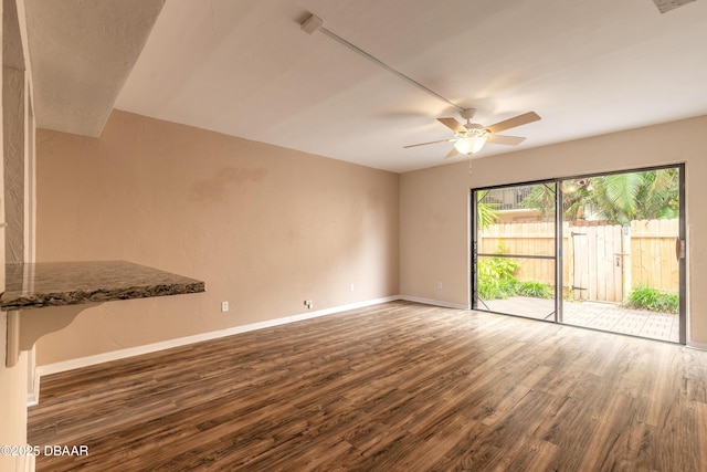 108 Mitchell Pl, Daytona Beach, FL 32118 - unfurnished room featuring wood finished floors, a ceiling fan, and baseboards