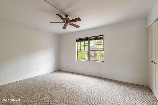 108 Mitchell Pl, Daytona Beach, FL 32118 - empty room with light colored carpet and ceiling fan