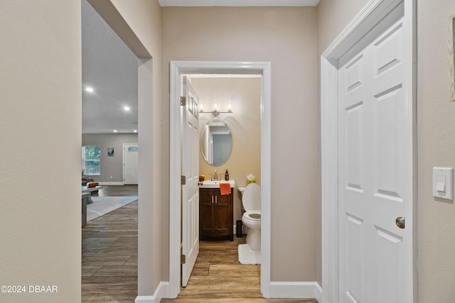 hallway featuring light wood-type flooring