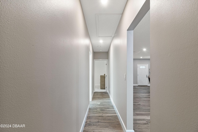 hallway featuring wood-type flooring