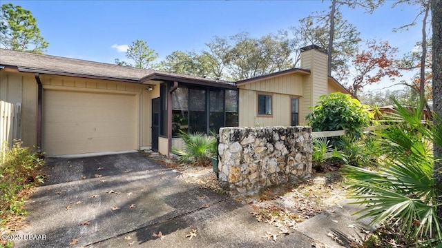 view of front of property with a garage