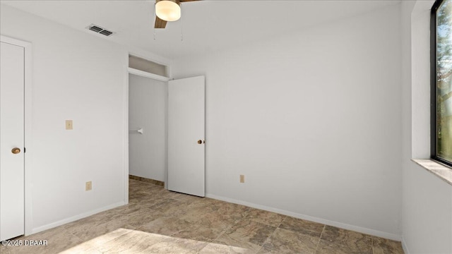 unfurnished bedroom with ceiling fan