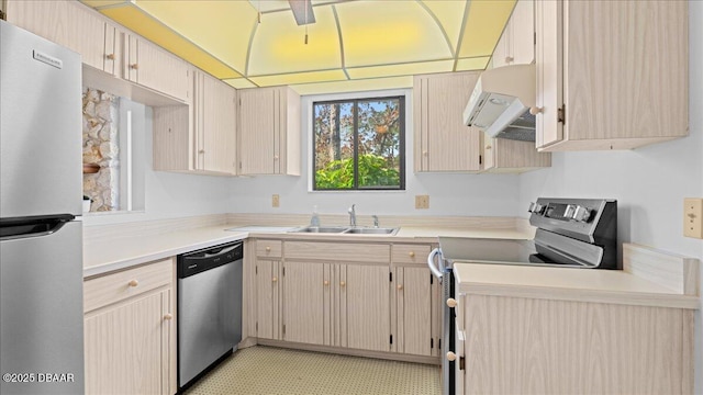 kitchen with ventilation hood, appliances with stainless steel finishes, sink, and light brown cabinetry