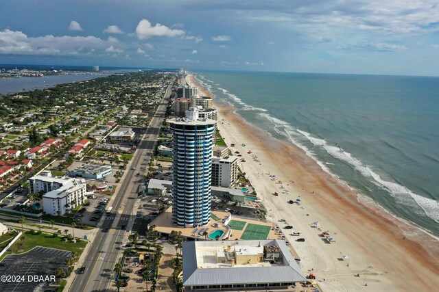 aerial view featuring a water view and a view of the beach