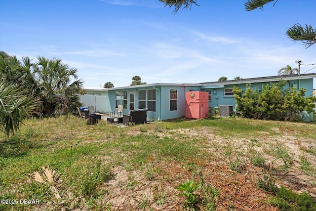 14 Essex Dr, Ormond Beach, FL 32176 - back of house with cooling unit