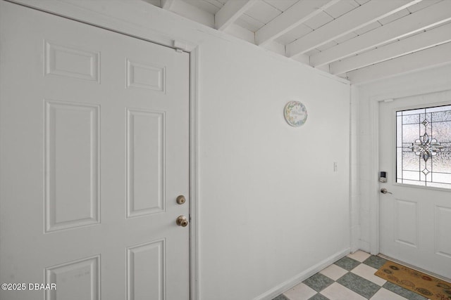 14 Essex Dr, Ormond Beach, FL 32176 - doorway with beamed ceiling and light floors