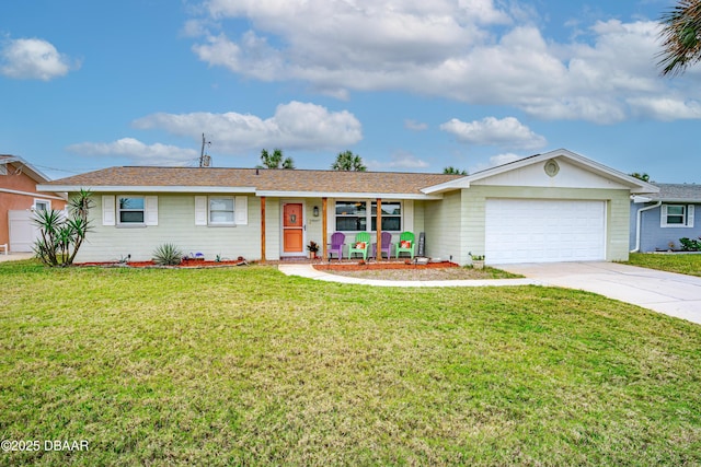 ranch-style home with a garage and a front lawn