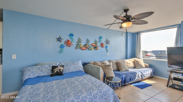 1233 S Atlantic Ave Unit 102, Daytona Beach, FL 32118 - bedroom with tile patterned floors and a ceiling fan