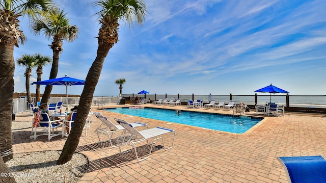 1233 S Atlantic Ave Unit 102, Daytona Beach, FL 32118 - community pool with a patio area