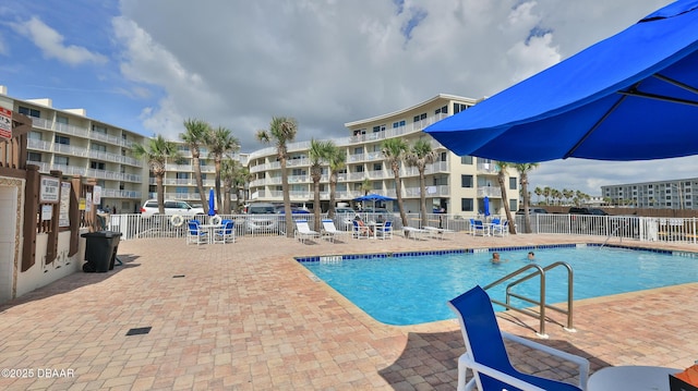 1233 S Atlantic Ave Unit 102, Daytona Beach, FL 32118 - community pool with a patio area