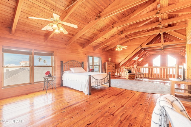 109 Avalon Dr, Ormond Beach, FL 32176 - unfurnished bedroom with lofted ceiling with beams, wood walls, wooden ceiling, and light wood-style floors