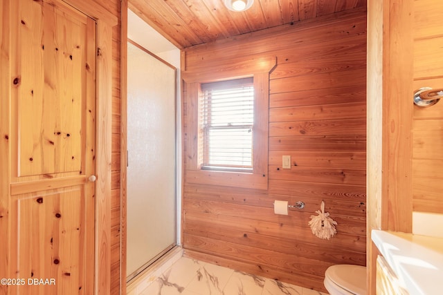 109 Avalon Dr, Ormond Beach, FL 32176 - full bathroom featuring marble finish floor, wood walls, a shower stall, and toilet