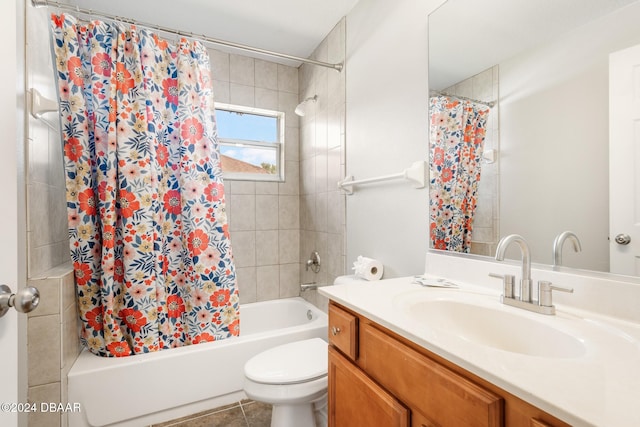 full bathroom featuring toilet, shower / tub combo, vanity, and tile patterned flooring