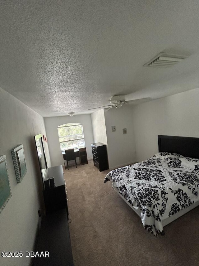 539 Lake Bridge Dr, Ormond Beach, FL 32174 - carpeted bedroom featuring a textured ceiling