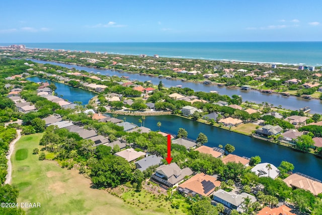 bird's eye view with a water view