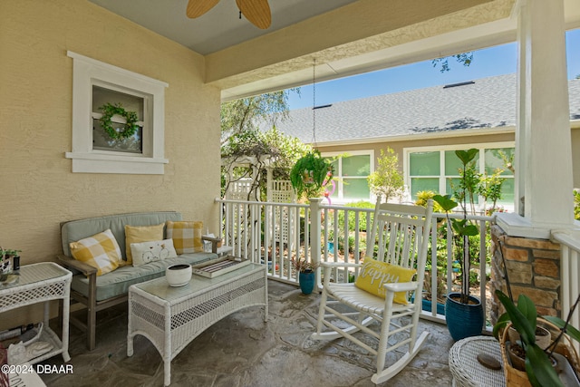 view of patio featuring ceiling fan