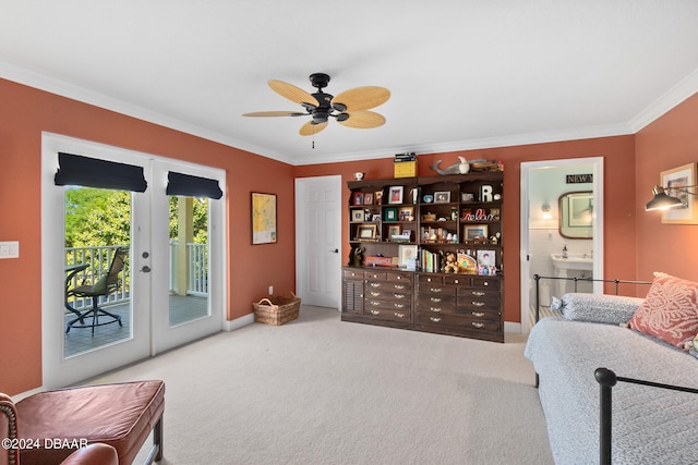 sitting room featuring ornamental molding, ceiling fan, and carpet floors