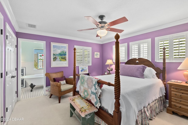 carpeted bedroom featuring a closet, ceiling fan, and crown molding