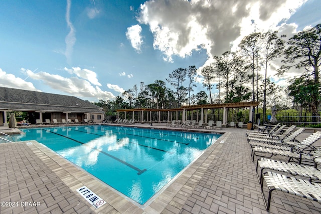 view of pool featuring a patio