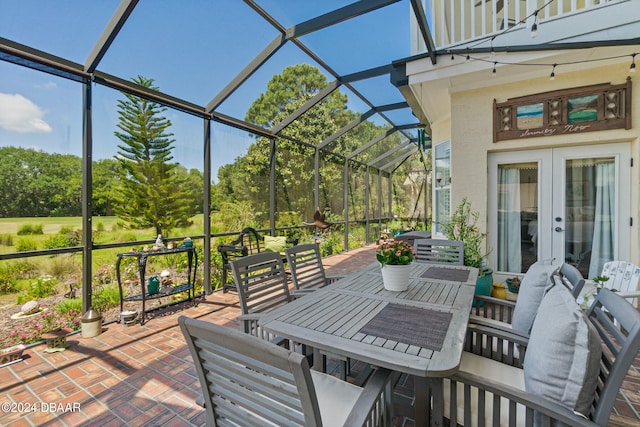 view of patio / terrace with a lanai and french doors