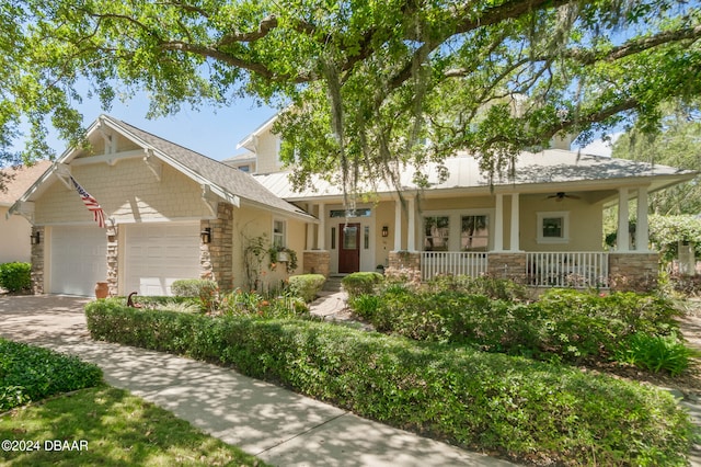 craftsman house featuring a porch and a garage