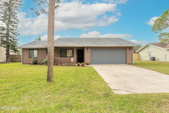 ranch-style home featuring central air condition unit, a porch, a front yard, and a garage