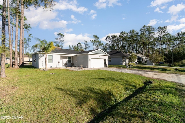 ranch-style house featuring a garage, a front yard, driveway, and stucco siding