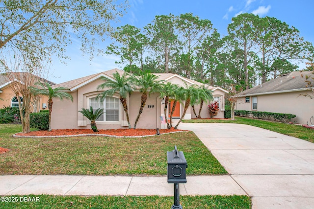 ranch-style house with a front yard