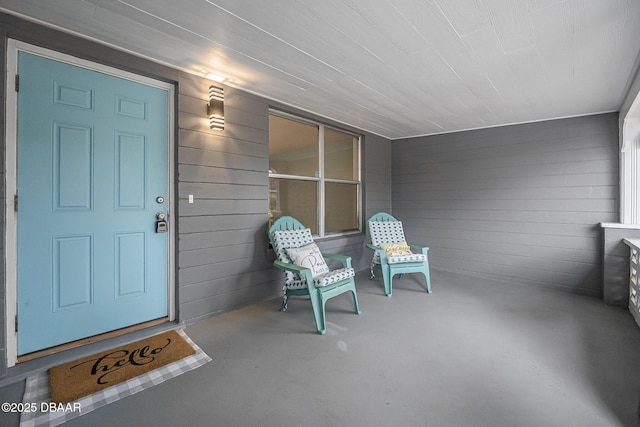 doorway to property with a porch