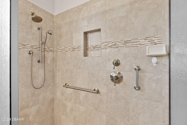 bathroom with tiled shower