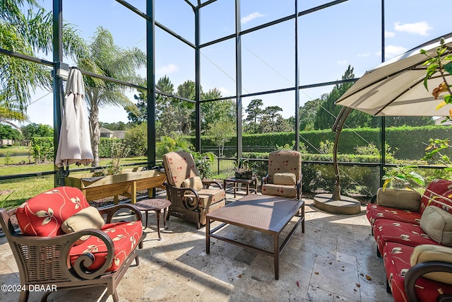 view of patio / terrace with a lanai