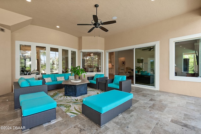 view of patio / terrace with ceiling fan and outdoor lounge area