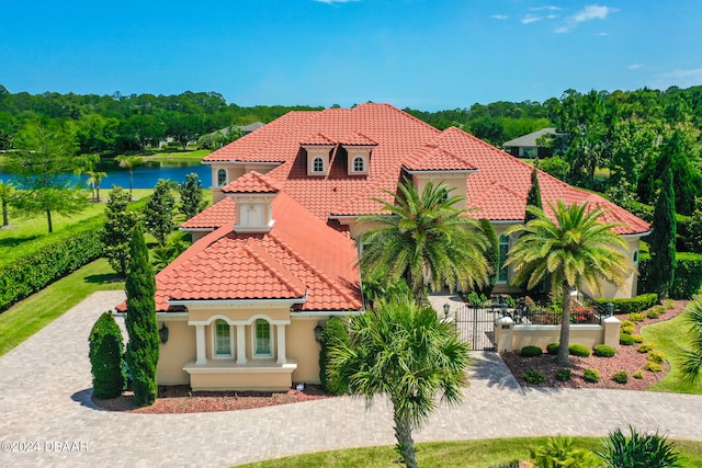 view of front of home featuring a water view